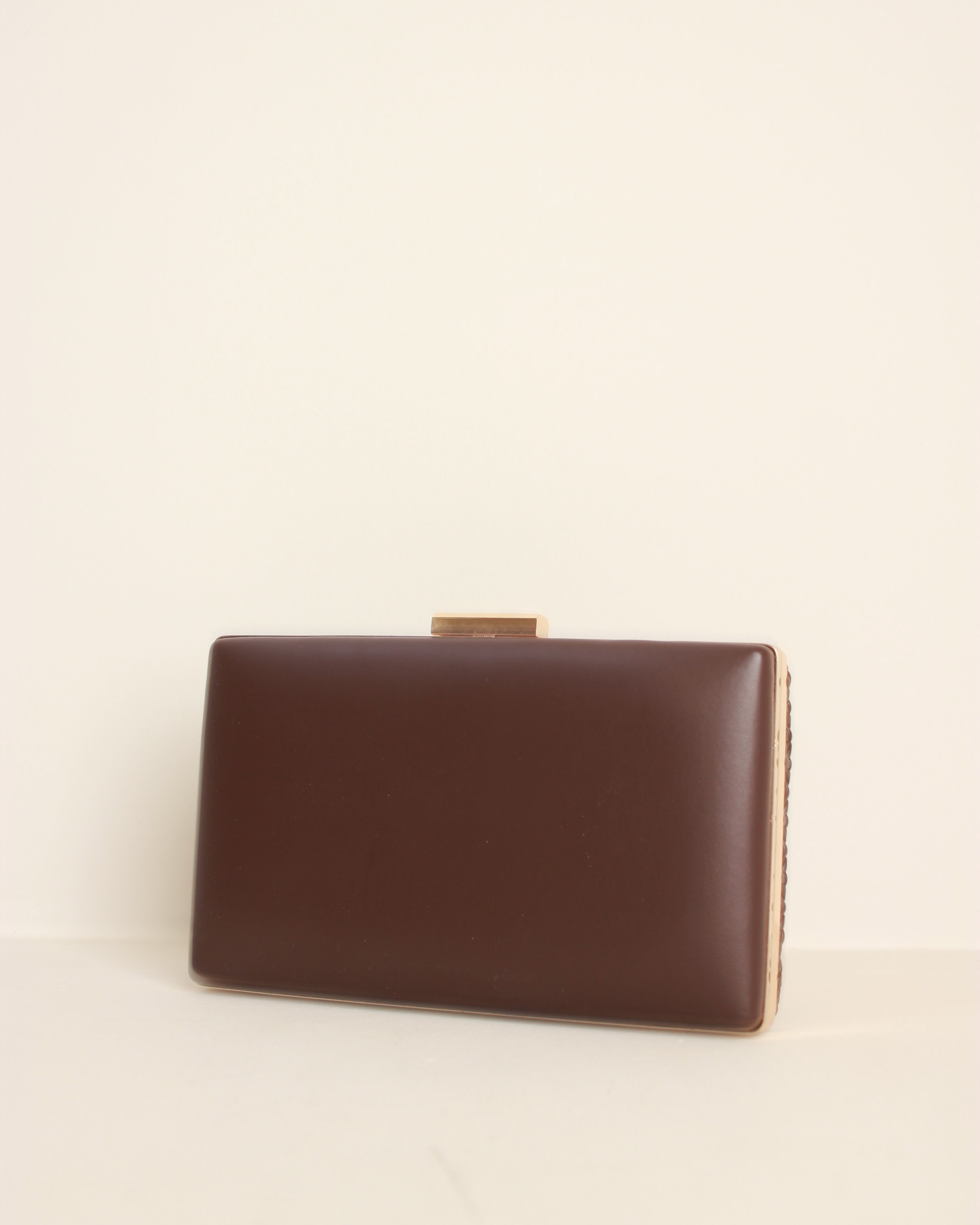 CLUTCH POLIPIEL TRENZADO