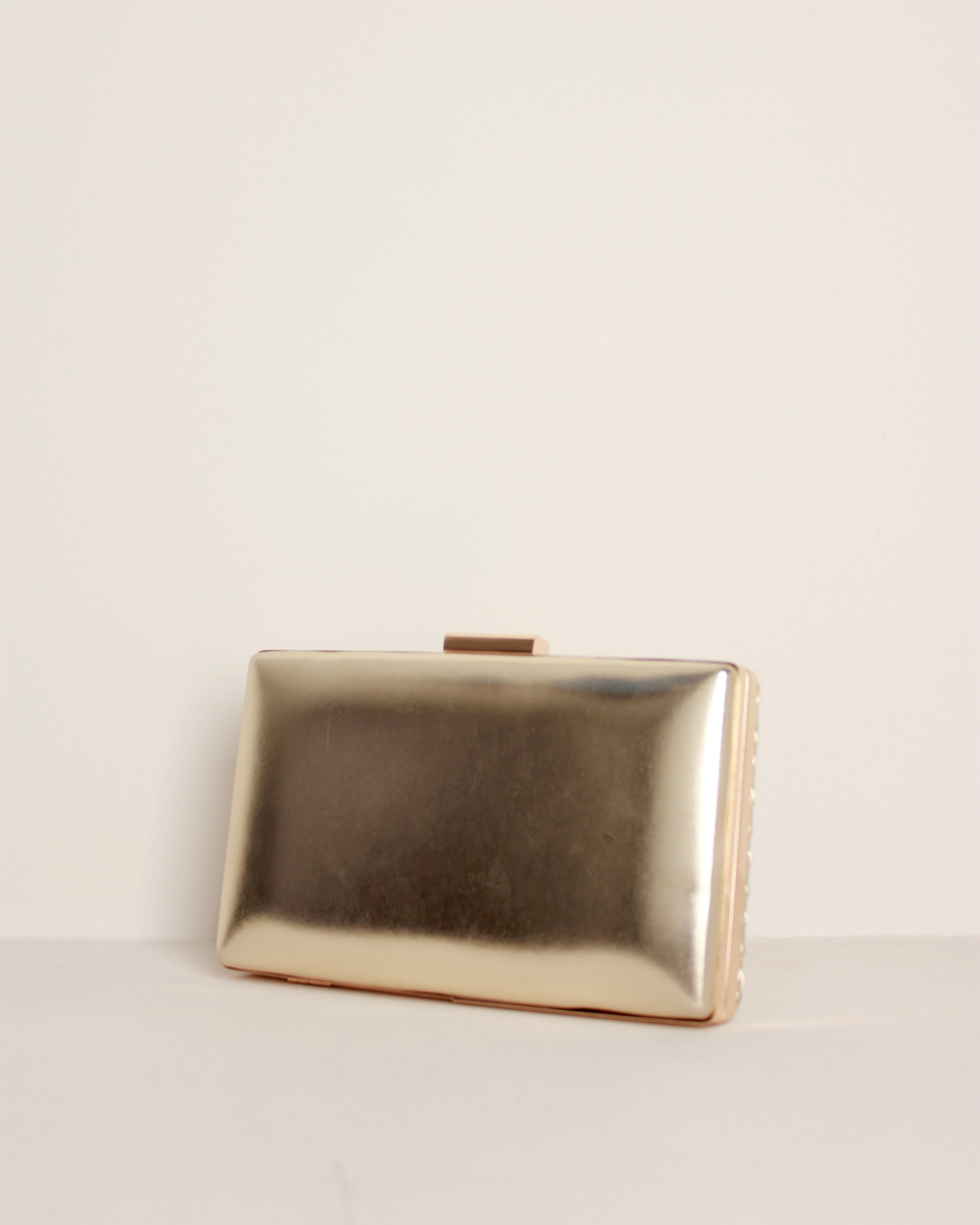 CLUTCH POLIPIEL TRENZADO