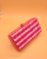 CLUTCH ONDAS NACAR FUCSIA