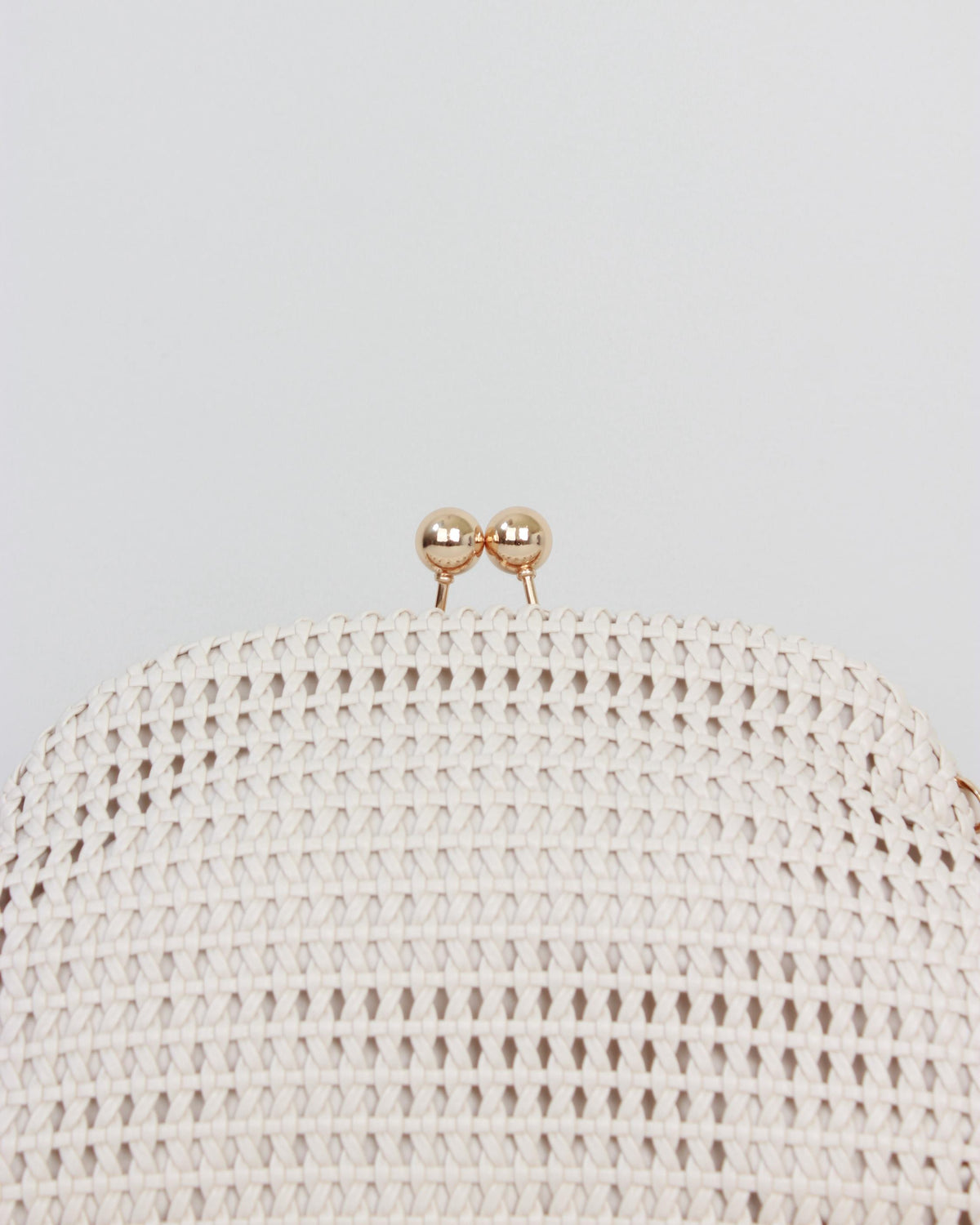CLUTCH POLIPIEL TRENZADO